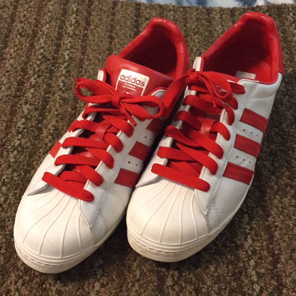 Red and white adidas superstar